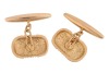A pair of oblong cufflinks, with reeded details at the centre, fitted with linked torpedo backs, yellow metal marked '18ct', total weight of items 9.61 grams. - 2