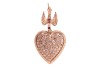 A heart-shaped pendant with diamonds, comprises a hollow heart pendant in yellow precious metal, fully pav&eacute; set with rose-cut diamonds, engraved scrollwork on the edges, pierced lattice and daisy motif at the reverse, suspending on a dove surmount with di