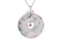 A jade pendant on chain, comprising a large jadeite bi disc, of mottled green on a bluish white ground, measuring 5.5 cm wide, to a trefoil mount embellished with rubies, suspended on a loose rope chain 77.0 cm, white metal marked '14K', 35.5 grams.