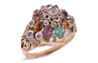 A Thai 'Noppakao' princess ring, tiered ring head encrusted with pear cabochons of various gemstones, and CZ embellishments, leading to shank, gilt metal, size M&frac12;, 3.2 grams.