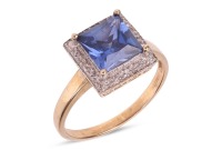 A synthetic sapphire dress ring in 9ct gold, the square-cut synthetic sapphire of 7.9 x 7.8 mm, in a conforming illusion surround with diamond accents, British assay marks, size T, 3.7 grams.