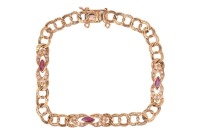 A gem-set figure-of-eight link bracelet, comprising a series of figure-of-eight links with navette-cut ruby spacers in a surround set with CZs, completed with a concealed tongue clasp, unmarked yellow metal surface testing as 18ct, overall length 18.5 cm,