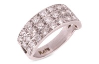 A diamond-set band ring, featuring three grain-set rows of ten round brilliant-cut diamonds, with an estimated total carat weight of 0.87ct, the rows separated by millegrained bar detail, ring head measuring 7.5mm in width, to a white metal ring shank mar