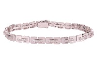 A diamond-set link bracelet, comprising a series of square links with canted corners, with brushed texture, connected with diamond-set bar links, each grain-set with five round brilliant-cut diamonds, measuring 16.0cm in length, completed with an integral