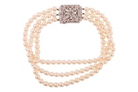 A cultured pearl choker necklace with a diamond-set clasp, comprising three rows of round cultured pearls, completed with a white metal square clasp, detailed with floral motifs and a Florentine finish, further highlighted with thirty-two round brilliant-