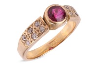 A ruby dress ring, comprising a central collet-set round-cut ruby, measuring approximately 4.9mm x 3.3mm, to shoulders grain set with six single-cut diamonds, in yellow metal marked &lsquo;18ct&rsquo;, size K, 4.0 grams.
