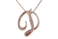 A diamond-set initial pendant on chain, in the form of a cursive letter D, pave-set with graduated round brilliant-cut diamonds, with an integral bail, 2.2 cm drop, suspended on a 45.0 cm long box link chain in white metal; all marked '18ct', 4.6 grams.