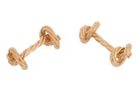 A pair of 'Marine knot' cufflinks, textured and terminated with nautical rope knot motifs, yellow metal marked '750', overall measures 2.5 cm wide, the total weight of items 13.8 grams.