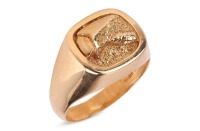 A textured signet ring in 18ct gold, the cushion-shaped ring head cast with abstract design, leading to a tapering shank, British import marks, ring head 1.8 x 1.6 cm, ring size Z+1, 25.89 grams.