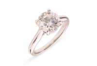 A diamond solitaire ring, composed of a round brilliant diamond, measuring approximately 8.1mm, with an estimated carat weight of 1.95ct, and an estimated colour and clarity grade H, VS, the girdle inscribed with &lsquo;Hearts on Fire 160813&rsquo;, in a four-prong s