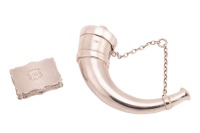 Two silver vinaigrettes; to include a cartouche-shaped vinaigrette, Birmingham 1843 by Nathaniel Mills, with hinged inner grille and engine turned exterior, 3.5 cm long, together with a probably Birmingham silver "Hunting Horn" vinaigrette by Levi & Salam