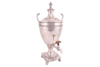 A George III silver tea urn and cover, London 1776, by William Holmes, in the manner of Robert Adams, with high-domed cover terminating in a heavy cast silver pineapple finial, the urn-shaped body engraved with the armorial bearings of Fletcher/Twemlow of