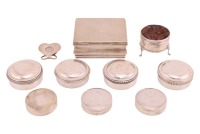 A small agglomeration of silver boxes and trinkets, including a small heart-shaped panel in veneration of Saint Olga of Kiev, pill boxes, a cigarette box and other items. 17.5 ozt/ 546 grams, the combined gross weight of weighable silver
