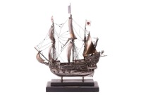 Captain G.B. Clilverd (Graham Barry Clilverd, 1883-1978) Of Maritime Interest: an incredibly detailed and intricate silver (unmarked) and hard enamel scale model of a full-masted English Galeon of 1450-1500, fully rigged in hand-made silver rigging to the